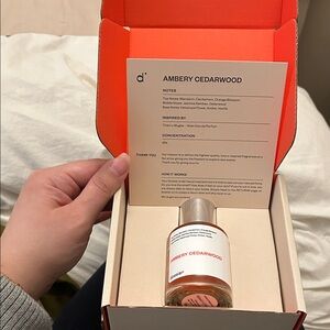 Dossier Ambery Cedarwood Fragrance - White and Orange
